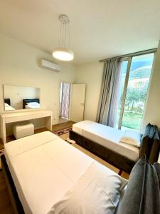 Giường trong phòng chung tại The Olive Retreat Villa, Green Coast +12 ảnh
