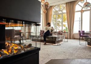 Posezení v ubytování SEETELHOTEL Strandhotel Atlantic das Boutiquehotel am Meer