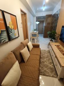 TV a/nebo společenská místnost v ubytování CLMN Staycation Metro Manila + 14 fotografií