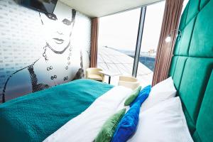 Tempat tidur dalam kamar di SONO hotel