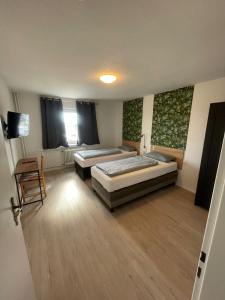 Katil atau katil-katil dalam bilik di Salzgitter Home