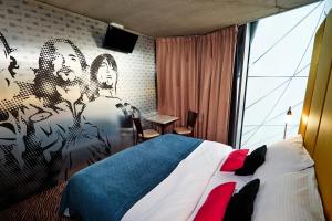 Tempat tidur dalam kamar di SONO hotel