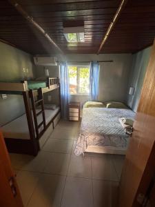 Postel nebo postele na pokoji v ubytování Vilagge PÉ NA AREIA - Itacimirim Bahia