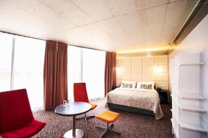 Llit o llits en una habitació de SONO hotel 37 fotos més