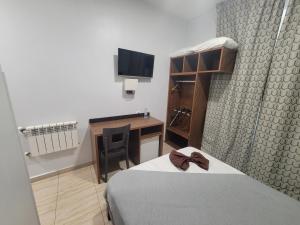 Postel nebo postele na pokoji v ubytování City Hotel Alger