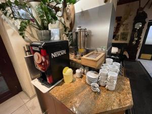 A kitchen or kitchenette at Hotel Club