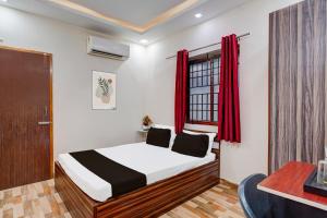 Postel nebo postele na pokoji v ubytování Super Hotel O Choolai Near Chennai Railway Station