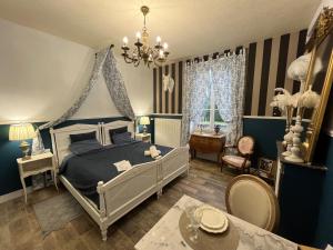 Postel nebo postele na pokoji v ubytování Gite Ecurie + 19 fotografií