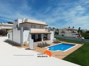 une villa avec piscine et une maison dans l'établissement #297 Espaçosa Vivenda V5 by Home Holidays, à Albufeira