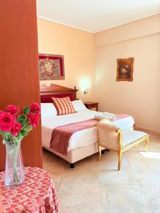 Postel nebo postele na pokoji v ubytování D'Angelo Palace Hotel