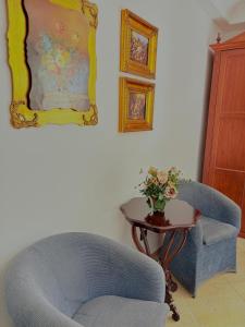 Posezení v ubytování D'Angelo Palace Hotel