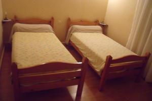Een bed of bedden in een kamer bij Maison d'Hote le Relais de morville