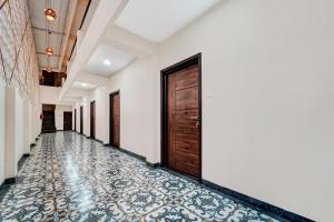 Fotografie z fotogalerie ubytování Super Hotel O Vilankurichi v destinaci Pīlamedu