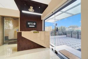 Fotografie z fotogalerie ubytování Super Hotel O Vilankurichi v destinaci Pīlamedu