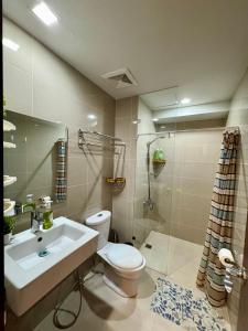 Koupelna v ubytování BGC One Uptown 2bedroom with balcony and 1 free parking