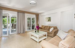 a living room with a couch and a table at Rab Barbat Villas 4 stars 300 sea in Barbat na Rabu