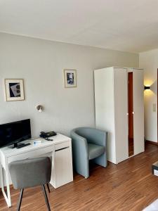 TV a/nebo společenská místnost v ubytování Hotel Martina