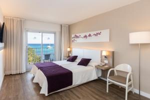 Postel nebo postele na pokoji v ubytování Hotel Brisa Marina