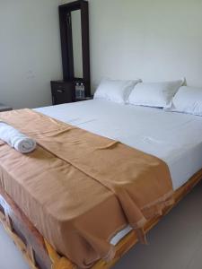 Postel nebo postele na pokoji v ubytování Saai Rooms