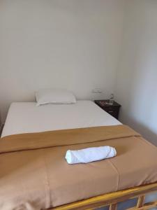 Postel nebo postele na pokoji v ubytování Saai Rooms