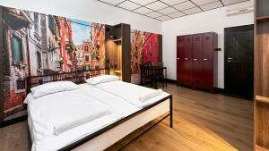 Postel nebo postele na pokoji v ubytování Vola Hostel