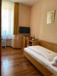 Postel nebo postele na pokoji v ubytování Hotel Klosterhof