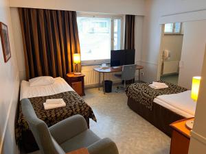 TV a/nebo společenská místnost v ubytování Budget Hotel Easystay