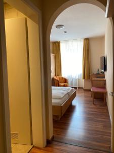 Postel nebo postele na pokoji v ubytování Hotel Klosterhof
