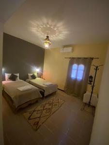 Cama o camas de una habitación en Kasbah Erg Chebbi