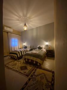 Cama o camas de una habitación en Kasbah Erg Chebbi