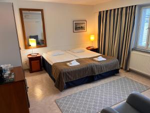 Postel nebo postele na pokoji v ubytování Budget Hotel Easystay