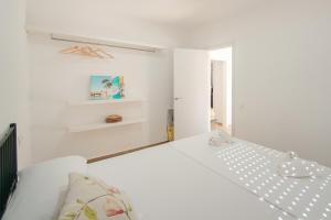 Postel nebo postele na pokoji v ubytování WELCS APARTAMENTO 182 PDA cerca de la playa