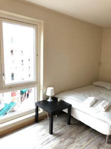 Postel nebo postele na pokoji v ubytování Guesthouse Centrum