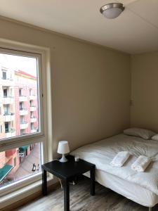 Postel nebo postele na pokoji v ubytování Guesthouse Centrum