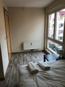 Postel nebo postele na pokoji v ubytování Guesthouse Centrum