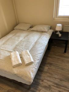 Postel nebo postele na pokoji v ubytování Guesthouse Centrum