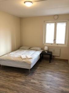 Postel nebo postele na pokoji v ubytování Guesthouse Centrum