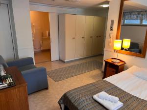 Postel nebo postele na pokoji v ubytování Budget Hotel Easystay