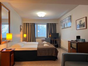 Postel nebo postele na pokoji v ubytování Budget Hotel Easystay