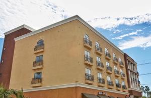 a building with balconies on the side of it at Grand Legacy At The Park in Anaheim