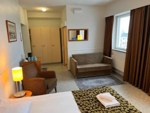 Posezení v ubytování Budget Hotel Easystay