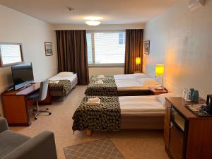 Postel nebo postele na pokoji v ubytování Budget Hotel Easystay