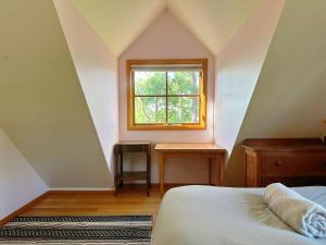 Snug Sanctuary - A gem in the forest 20 min to CBD客房内的一张或多张床位