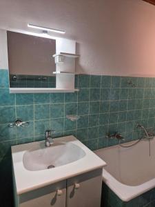 Koupelna v ubytování Bel appartement dans une maison villagesoise