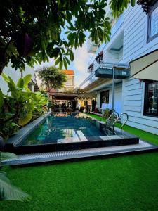 Bazén v ubytování Papaya Garden Homestay nebo v jeho okolí