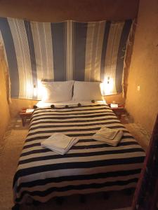 Un ou plusieurs lits dans un hébergement de l'établissement Kasbah Oulad Othmane