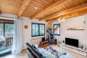 Χώρος καθιστικού στο Ferienhaus Elisabeth mit Fasssauna