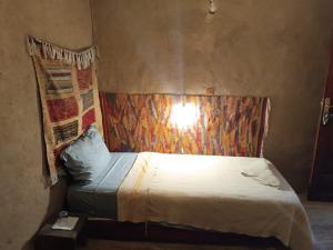 Un ou plusieurs lits dans un hébergement de l'établissement Kasbah Oulad Othmane