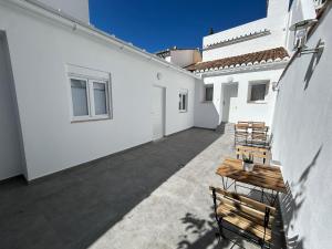 En balkon eller terrasse på Casa Peñas 1