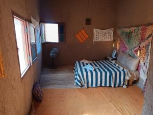 Un ou plusieurs lits dans un hébergement de l'établissement Kasbah Oulad Othmane